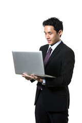 Asian businessman using a laptop.