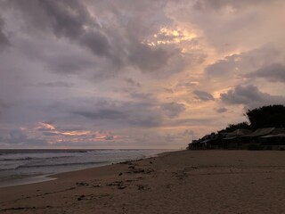 The atmosphere was cloudy and black clouds in the sky near the beach
