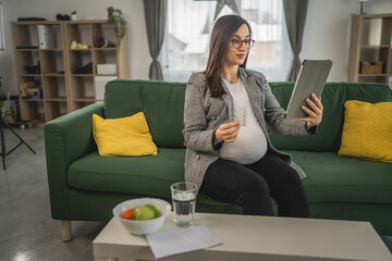 Expectant woman read leaflet take tablets medication or supplement