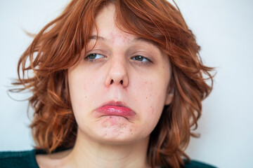  close-up portrait of a pensive teenage girl with red hair with a stylish anime hairstyle