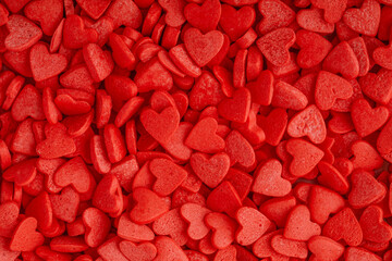 Red hearts background. Sweet candy hearts as background. Valentines day background - obrazy, fototapety, plakaty