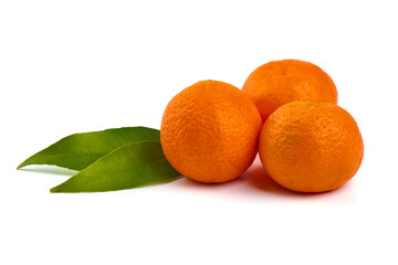 Tangerine or clementine with leaves, close-up, isolated on white background.