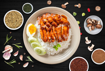 The photo of Thai food with sauce, herb, flavor on the dark wood table background