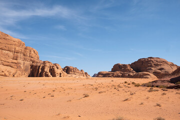 Fototapeta na wymiar The red desert plain in Wadi Rum Jordan