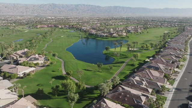 Heritage Palms Golf Course in Indio, California with drone video pulling back.