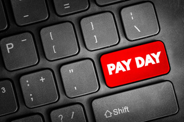 Pay Day is a specified day of the week or month when one is paid text button on keyboard, concept background