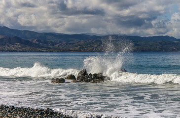 waves crashing on rocks near the shore on the Mediterranean Sea 14