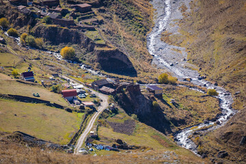 Panoramic view of the winding mountain river from above, the beauty and power of nature