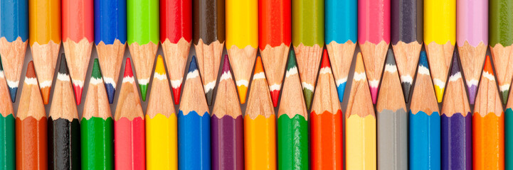 Colored pencils arranged as a symbol for teamwork and community