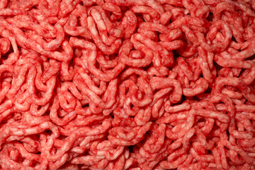 Raw minced beef close-up, top view.