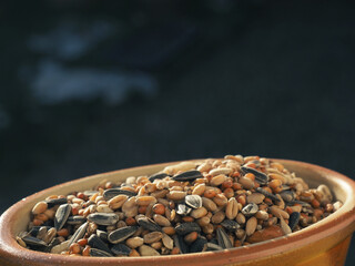Bird food in a ceramic bowl
