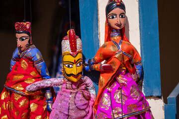 Indian colorful Rajasthani handmade Puppets and Crafts products at jodhpur. Selective focus.