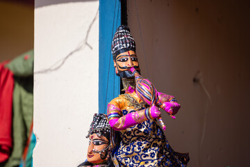 Fototapeta na wymiar Indian colorful Rajasthani handmade Puppets and Crafts products at jodhpur. Selective focus.