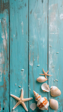 Seashells and starfish on turquoise wooden background
