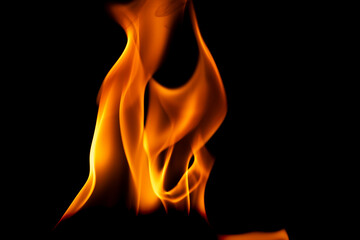 Hot flames on a black background. Beautiful flame of fire in the dark. Abstract of burning flames...