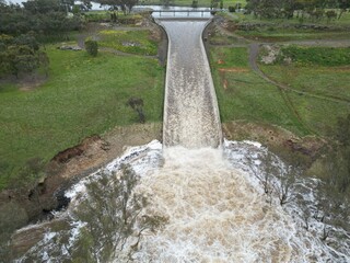 Lake Eppalock dam spillway overflowing into the Campaspe River  2024