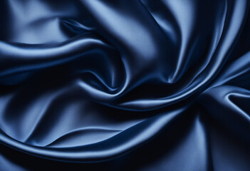 Obraz premium Dark blue elegant background. Crumpled satin texture background. The surface of a dark blue shiny fabric with nice folds.