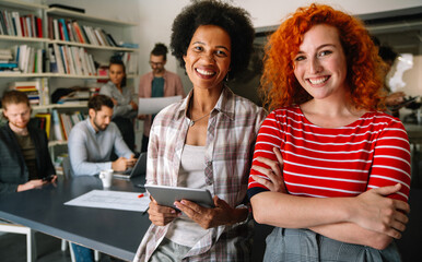 Happy coworker startup people working and having meeting with friendly diverse colleagues in office.