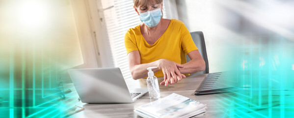 Businesswoman with medical face mask rubbing her hands with sanitizer; multiple exposure