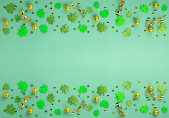 Golden Horseshoe, Gold Coins and Clover Leaves Shamrocks on Green Background for St Patricks Day...