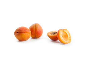 Apricot fruit whole and half isolated on white background..