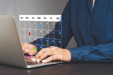 Businesswoman planning on a digital calendar and effective task management.