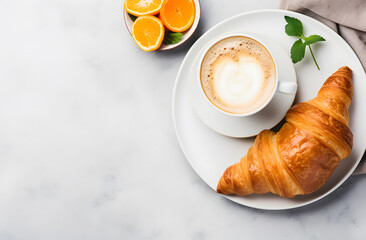 Cup of coffee and croissants on white background top view