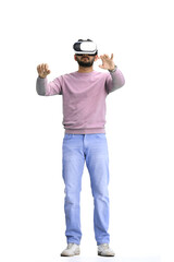 Man, on a white background, full-length, wearing VR glasses