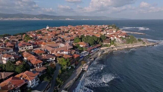 Old Town Nesebar And Beach In Daytime In Burgas, Bulgaria. - aerial ascend shot