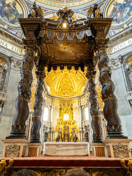 The Altar with Bernini's Baldacchino (baldachin) and the Apse in St. Peter's Basilica, Vatican City, Rome, Italy