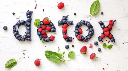 Fotobehang word detox made from berries on a white background, healthy eating, smoothie, food, fruit, tasty treat, healthy breakfast, weight loss, diet, nutrition © Julia Zarubina