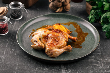 Portion of gherkin chicken with baked potatoes