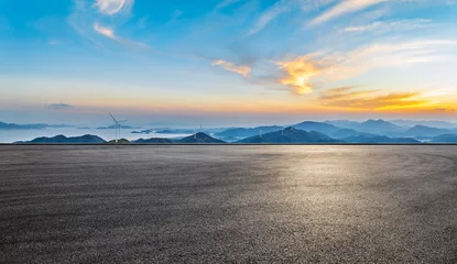 Foto op Canvas Asphalt road and mountain natural landscape at sunset. High Angle view. © ABCDstock
