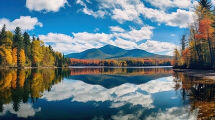 an exquisite panorama of mirror lake in lake placid, ny on a bright autumn