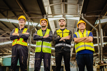 Engineer male team working in heavy industry standing together. group of professional people...