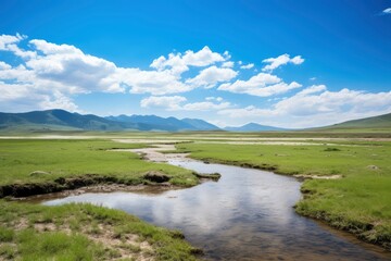 Obraz premium Serene Mountain Valley with Stream
