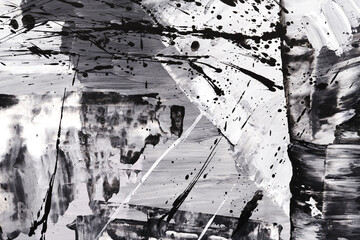 Obraz premium Black and white abstract background, art collage. Chaotic brush strokes and paint stains on paper