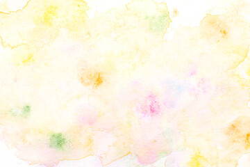 Abstract liquid art background. Yellow watercolor translucent blots on white paper.