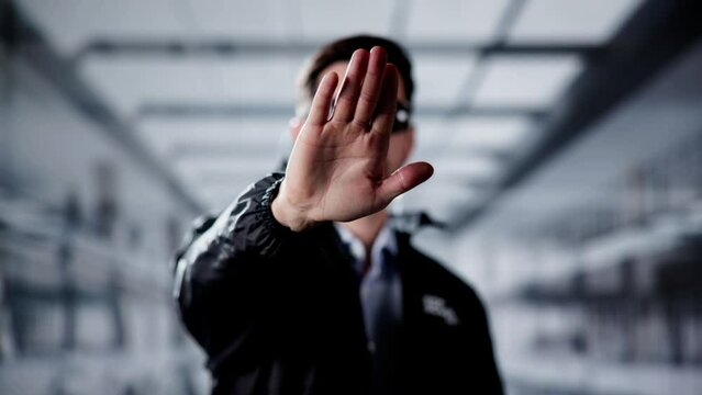 Security Guard Officer Making Stop Gesture