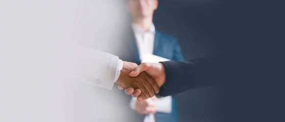 Foto op Canvas men or business people shaking hands with partner to greeting or dealing business, conflict dealing and resolution between the differences concept © cherdchai