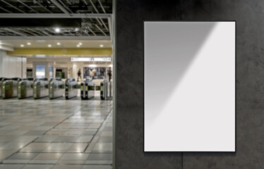 Blank billboard on the wall of subway. Ideal for mockup, messages, advertising and text. For commercial and marketing use.