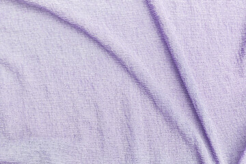 Closeup waving purple fabric background, blank purple fabric texture background