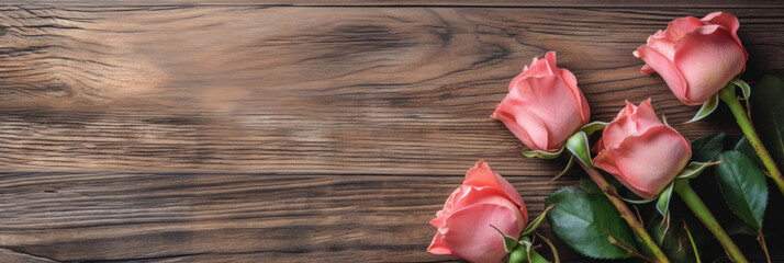 Naklejka na ściany i meble Roses on wooden board for Valentines Day background.