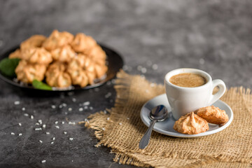 Homemade coconut cookies on a gray background. Healthy food concept. For advertising confectionery products