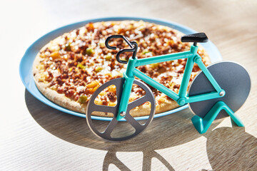 Kitchen pizza cutter like a bicycle