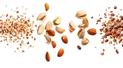 Fotobehang set with Flying in air fresh raw whole and cracked pistachios, almonds and hazelnut isolated on white background. © buraratn