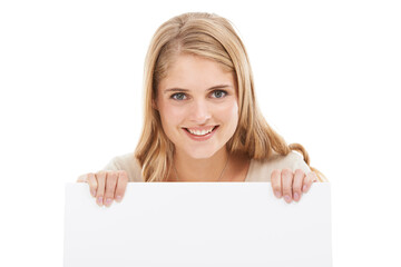 Happy, portrait and woman with blank poster, sign or banner in white background and mock up. Studio, space and person with empty signage for announcement information, news on cardboard and paper