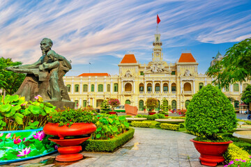 Bronze Statue and Lush Gardens at a Historical Government Building, French Colonial Architecture,...