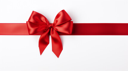 bright red ribbons tied in a bow on white background 