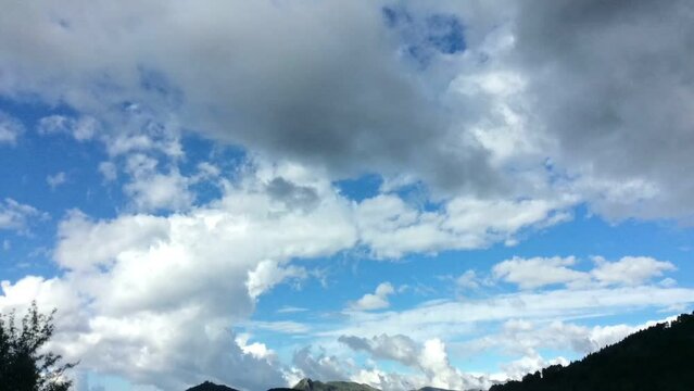 windy clouds on blue sky timelapse